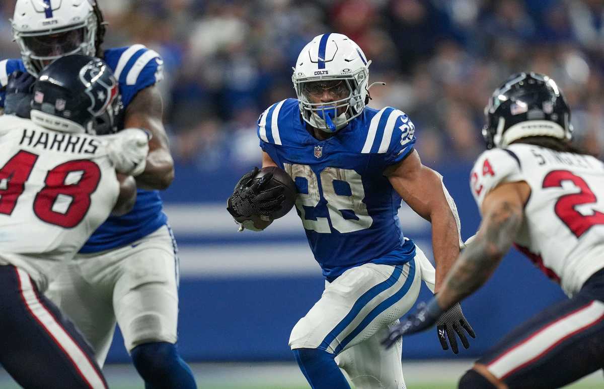 Indianapolis Colts running back Jonathan Taylor (28) runs the ball on Saturday, Jan. 6, 2024, during a game against the Houston Texans at Lucas Oil Stadium in Indianapolis.  
